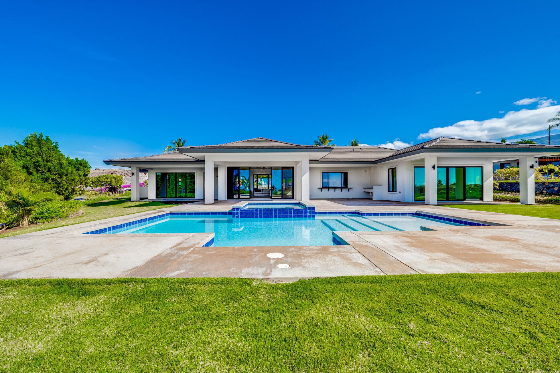 Covered lanai and interior at 837 Anapuni Loop